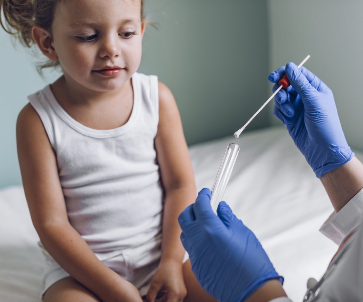 Little Girl During a Mouth Swab Medical Test at the Hospital Lakeland
