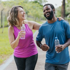 Relaxed couple of friends during physical exercise
